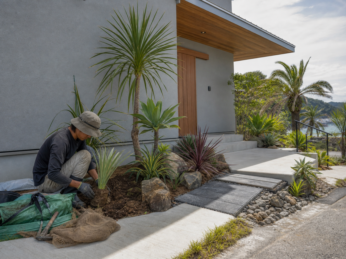 住宅のアプローチで植栽を行う施工イメージ